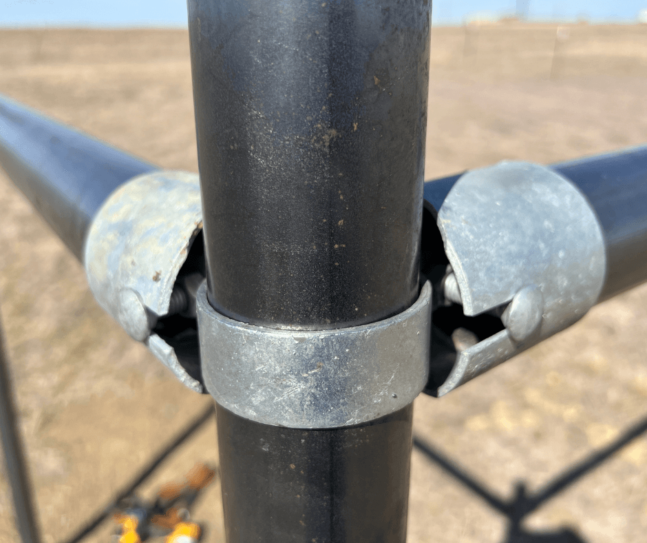 metal fence pipe connector close-up