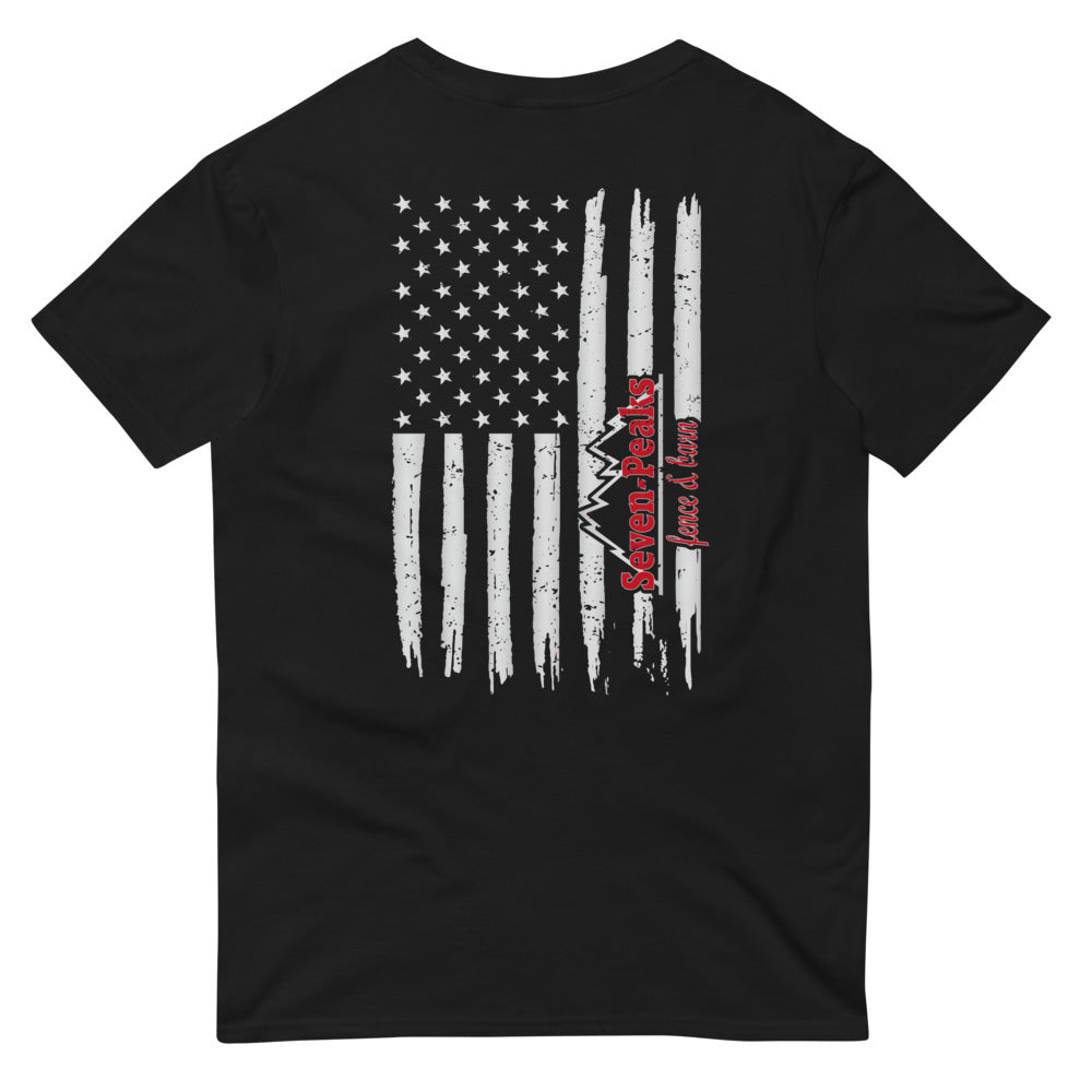 Black t-shirt with American flag and "Seven Peaks Peace & Love" logo on back